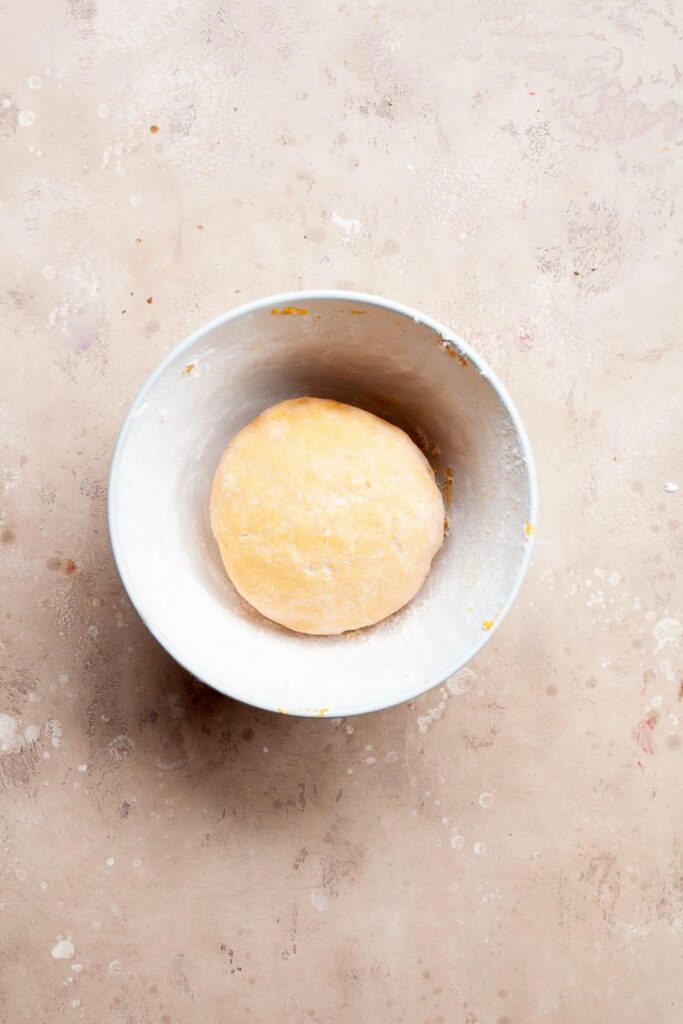 sweet potato gnocchi dough in a mixing bowl