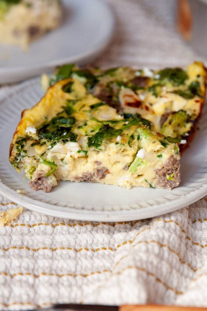 two slices of air fryer frittata to show soft and moist texture