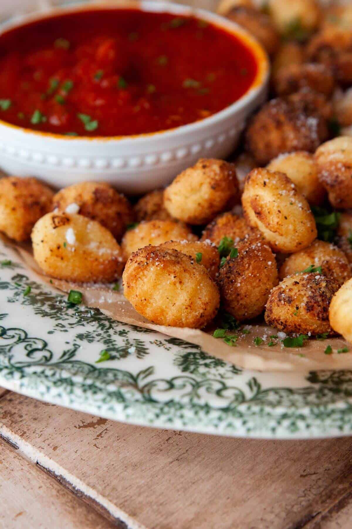 Close up of air fried crispy gnocchi.