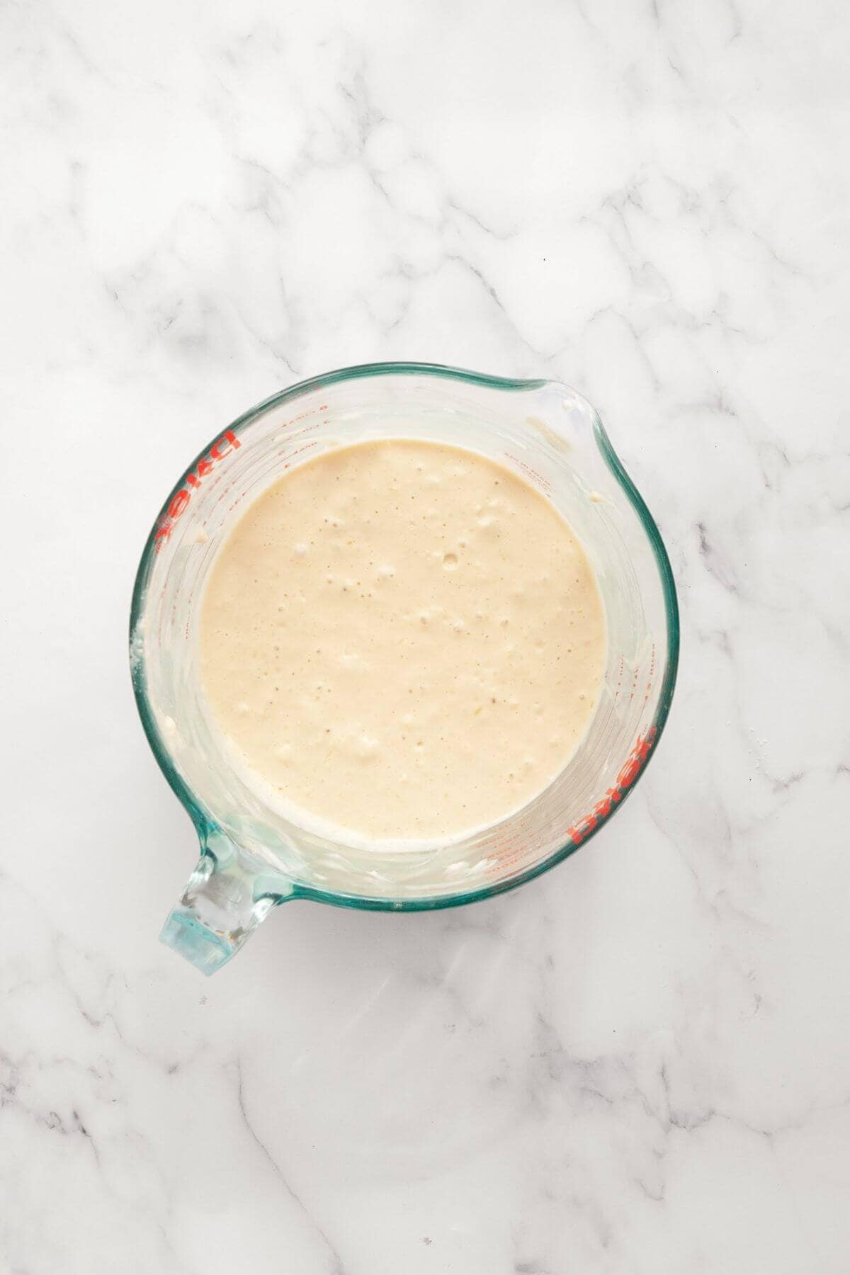 Oat milk pancake batter in a bowl.