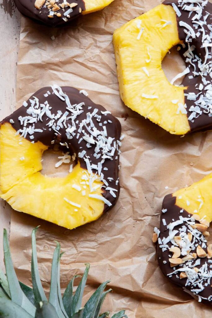 3 ingredient chocolate covered pineapple rings with shredded coconut