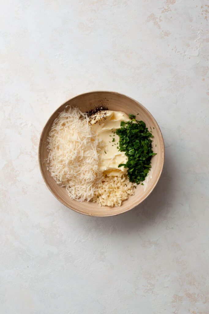 garlic butter spread ingredients in a bowl