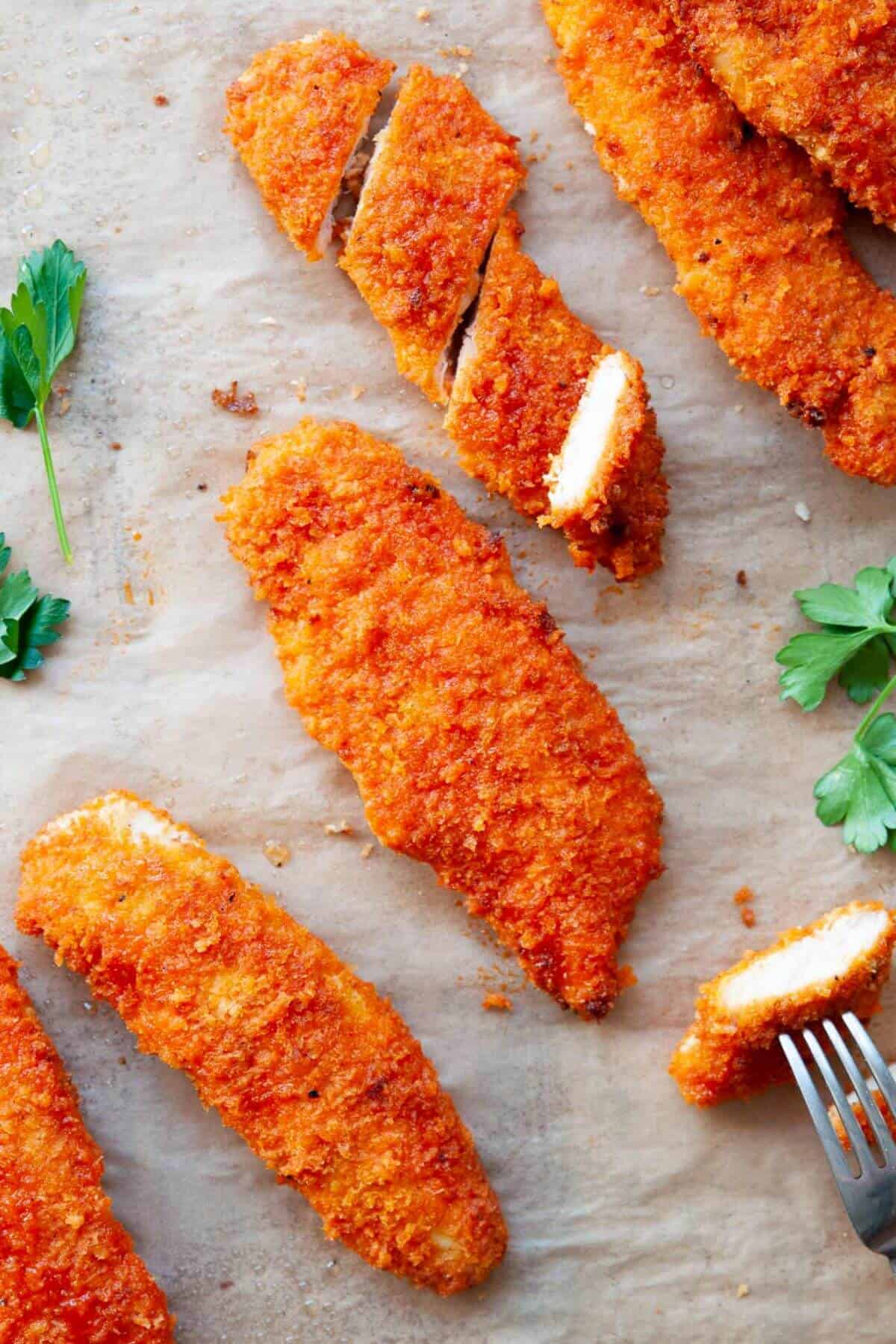 Extra crispy air fryer Nashville hot chicken tenders with golden crunch and sweet and spicy Nashville sauce.