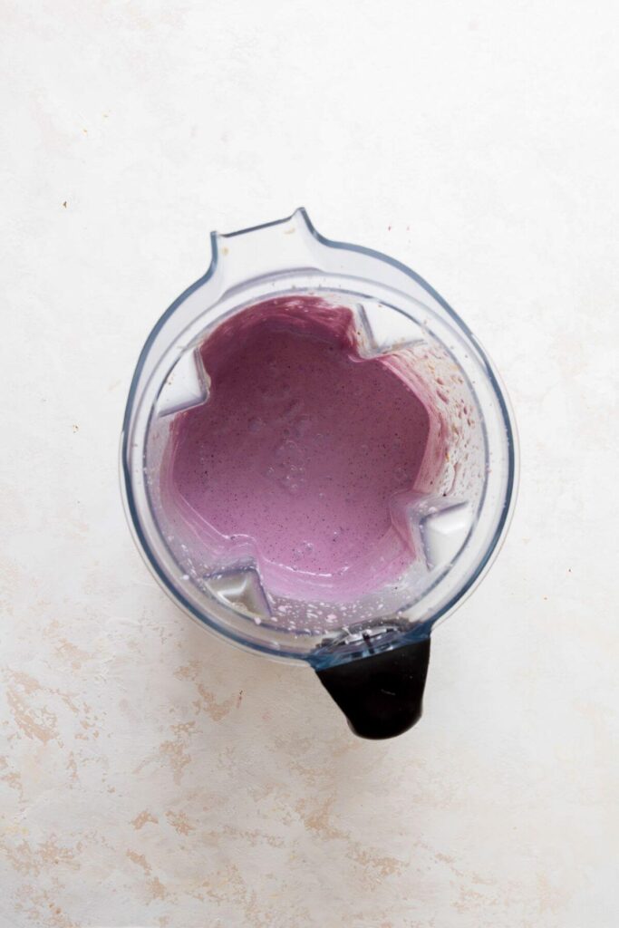 thick and creamy smoothie in blender after being blended
