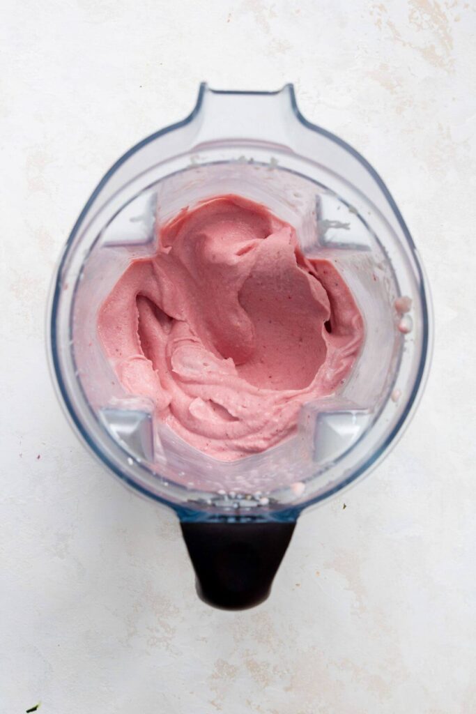 thick and creamy strawberry smoothie in a blender