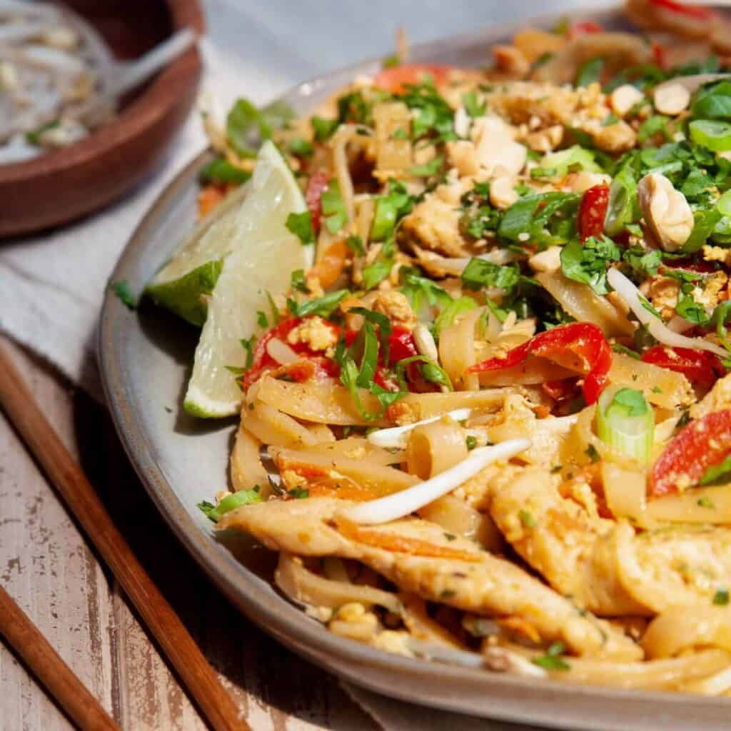 Better-than-takeout healthy chicken pad Thai with 38 grams of protein.