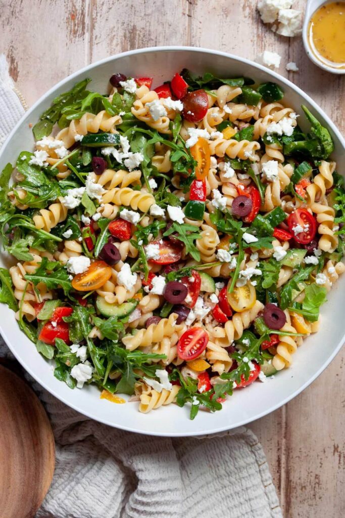easy Greek pasta salad made with Banza chickpea pasta