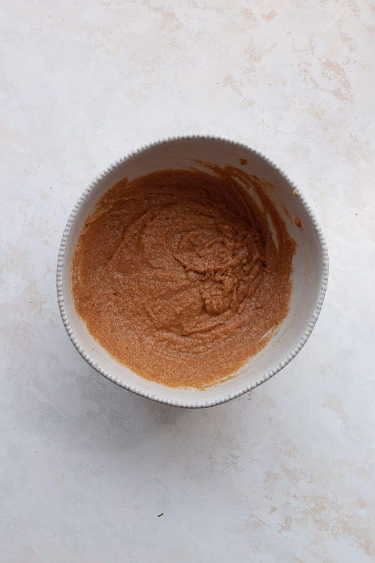 Thick almond flour coffee cake batter fully mixed and smooth.