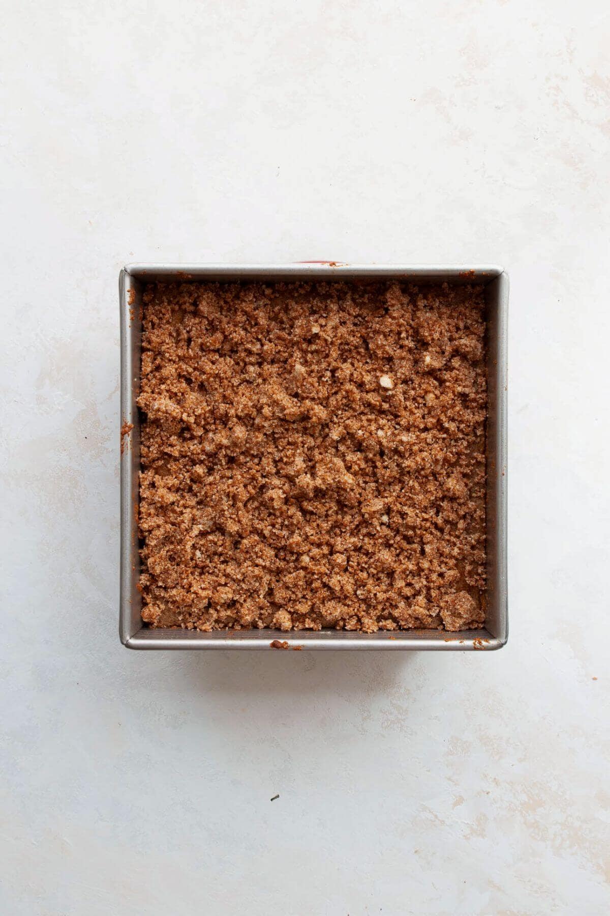 Crumb topping added to coffee cake batter before baking.