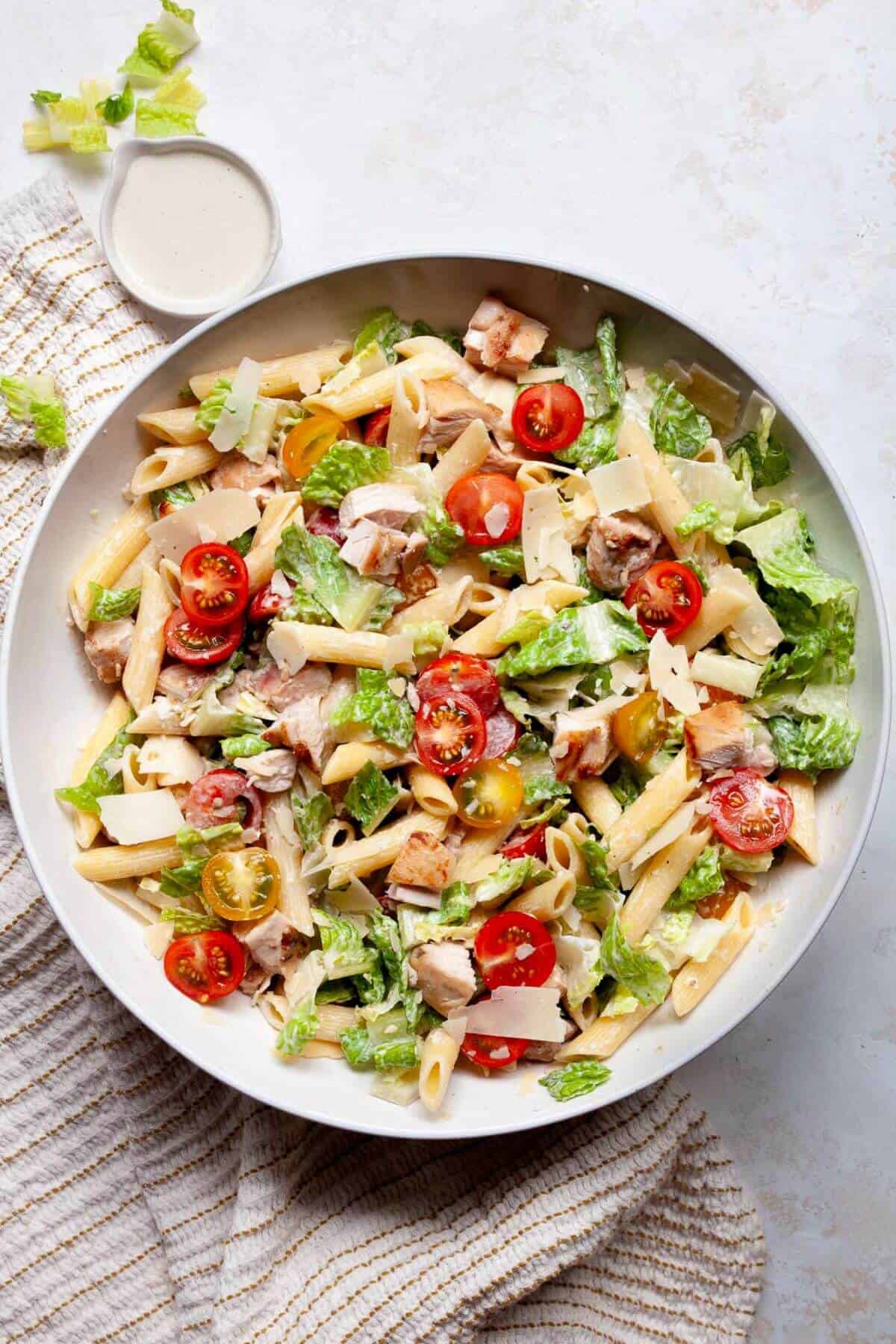 healthy chicken Caesar pasta salad with homemade high protein, creamy caesar yogurt dressing