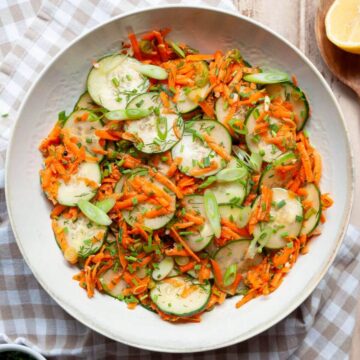 Italian-inspired cucumber carrot salad with fresh herbs and apple cider vinaigrette