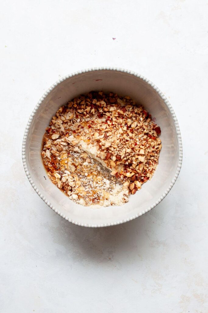 walnut oatmeal crumble topping in a mixing bowl