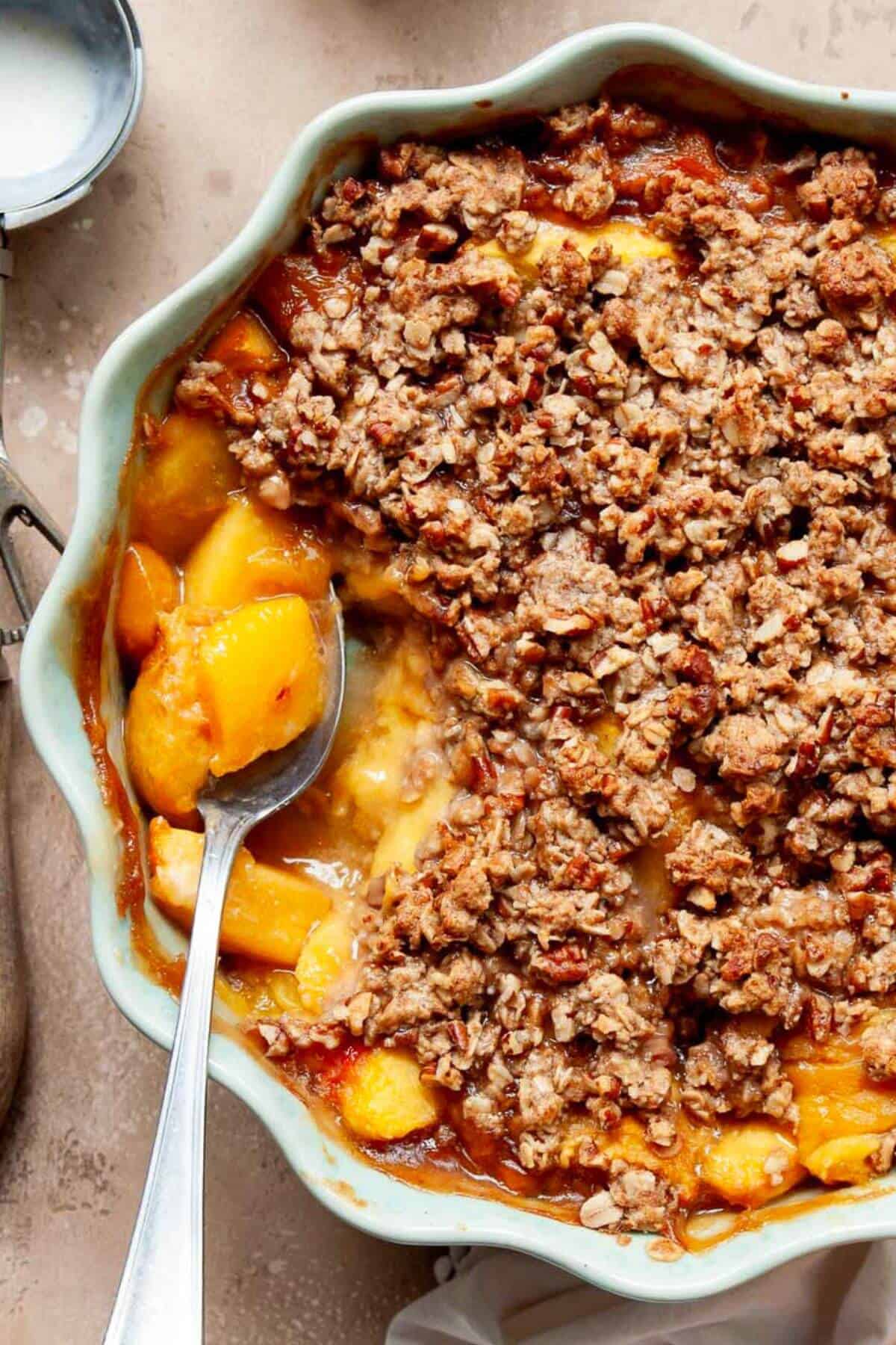 Healthy peach crisp with a golden oat crumble and jammy, naturally sweet peach filling.