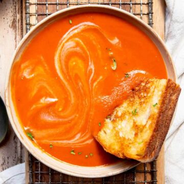 dairy-free and gluten-free tomato soup with a grilled cheese sandwich