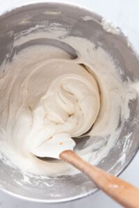 healthy cream cheese yogurt frosting in a ming bowl