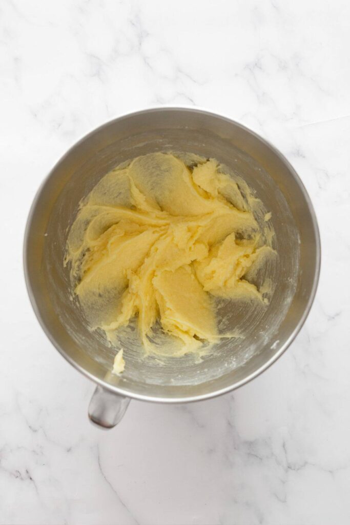 whipped butter and sugar in a mixing bowl
