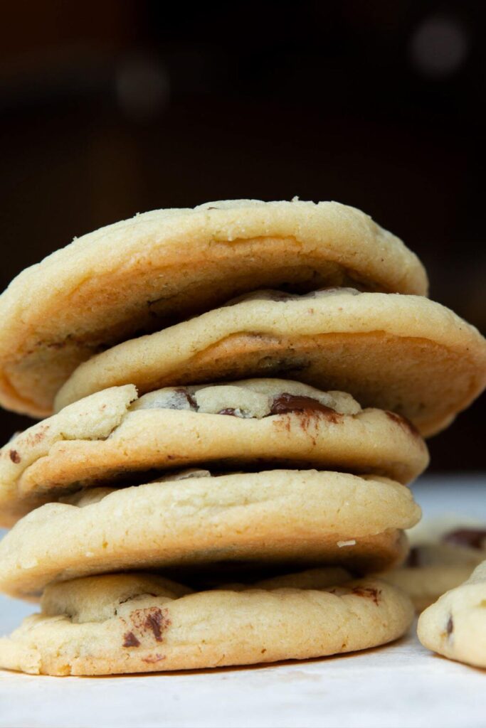 stack of chocolate chip sugar cookies to show pale golden bottoms