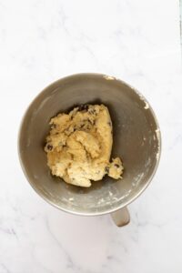 chocolate chip sugar cookie dough in a mixing bowl