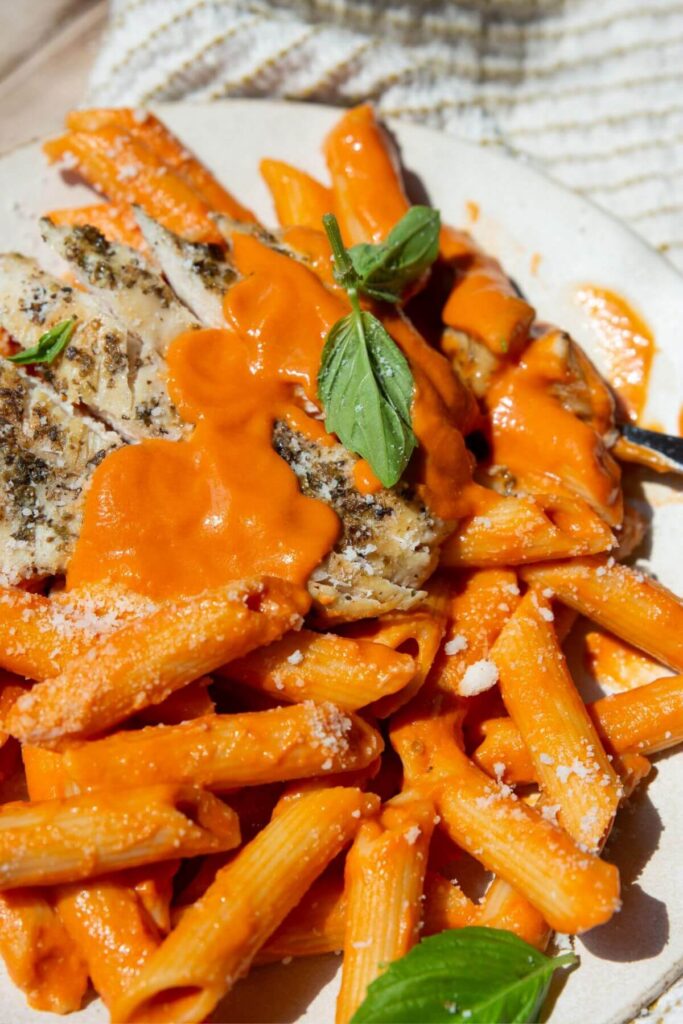 healthy penne alla vodka with chicken on a plate