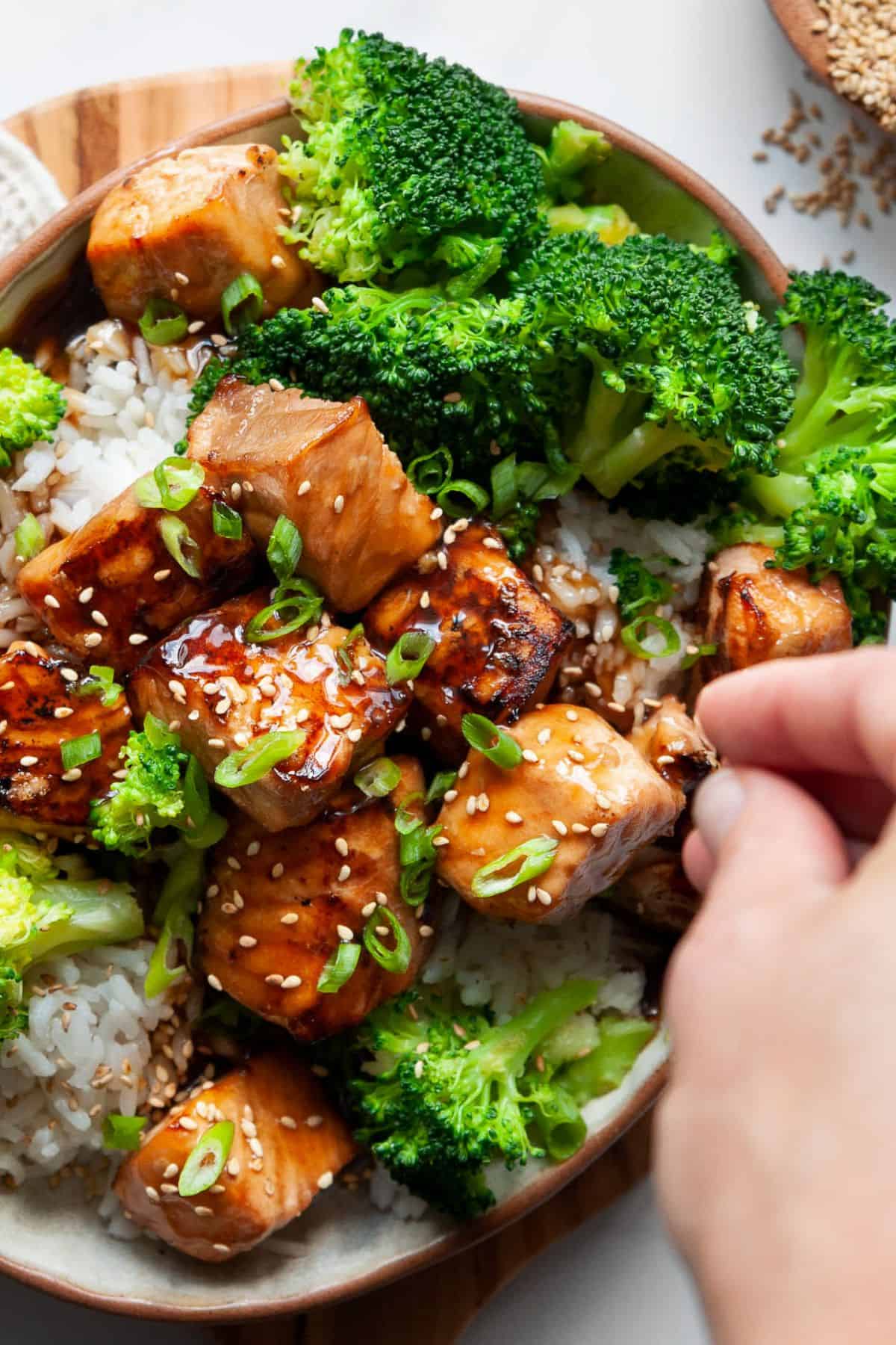 Crispy air fryer teriyaki salmon bites with caramelized edges.