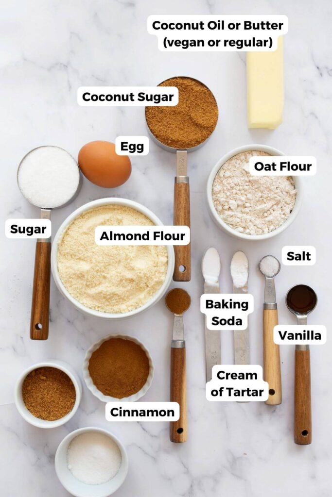 all ingredients in healthy snickerdoodles in small bowls with labels