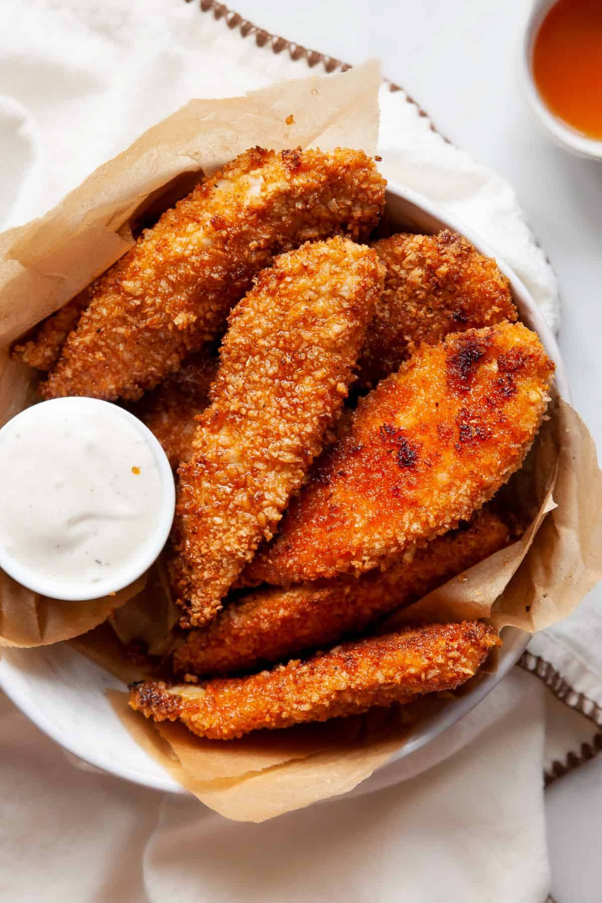 Crispy hot honey chicken tenders coated in a sweet and spicy hot honey sauce.