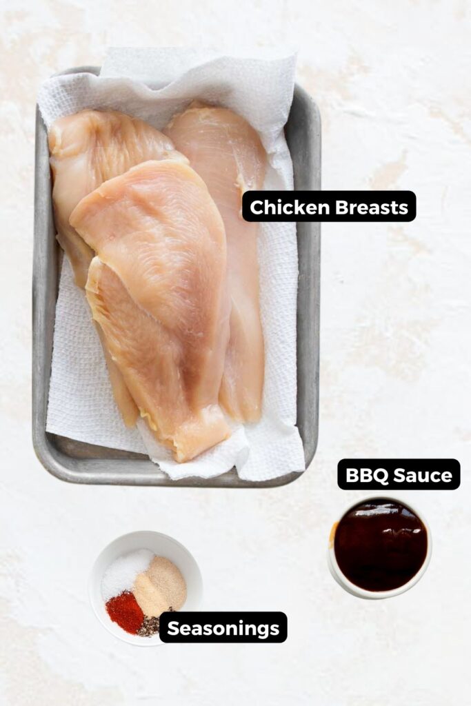 all ingredients in air fryer BBQ chicken in bowls with labels