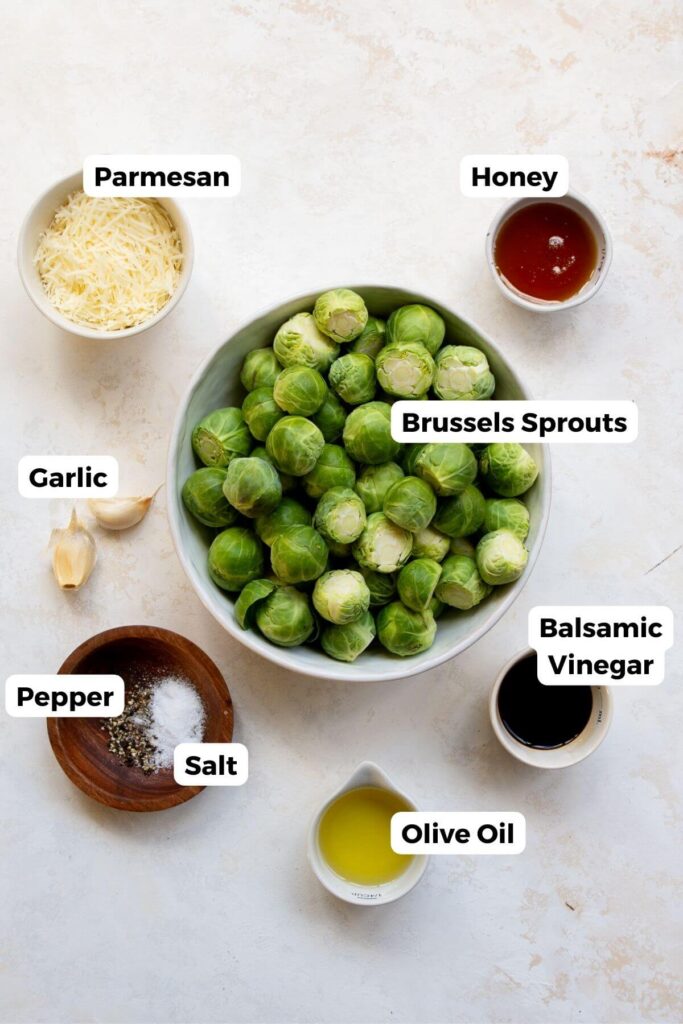 all ingredients in smashed Brussels sprouts recipe in small bowls with labels