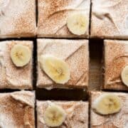 Moist gluten-free banana cake with homemade healthy cream cheese frosting.