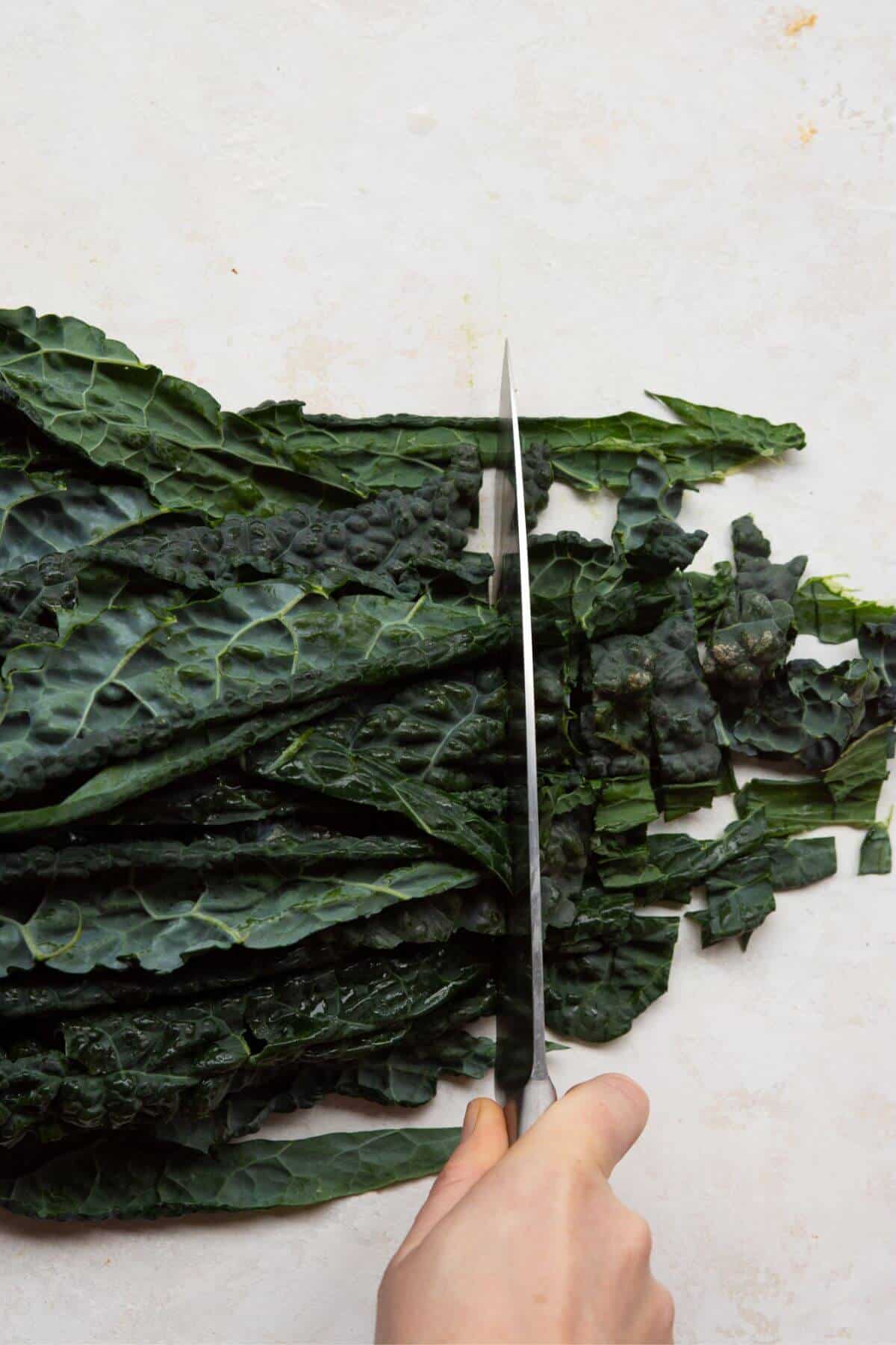 How to cut lacinato kale after de-stemming.