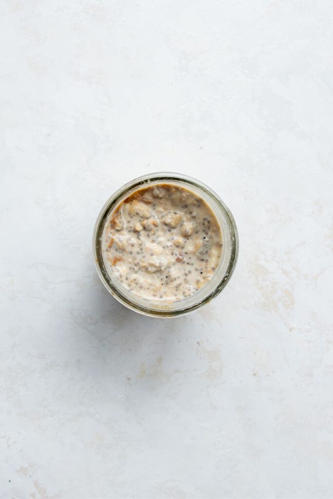 peanut butter overnight oats in a mason jar after soaking overnight