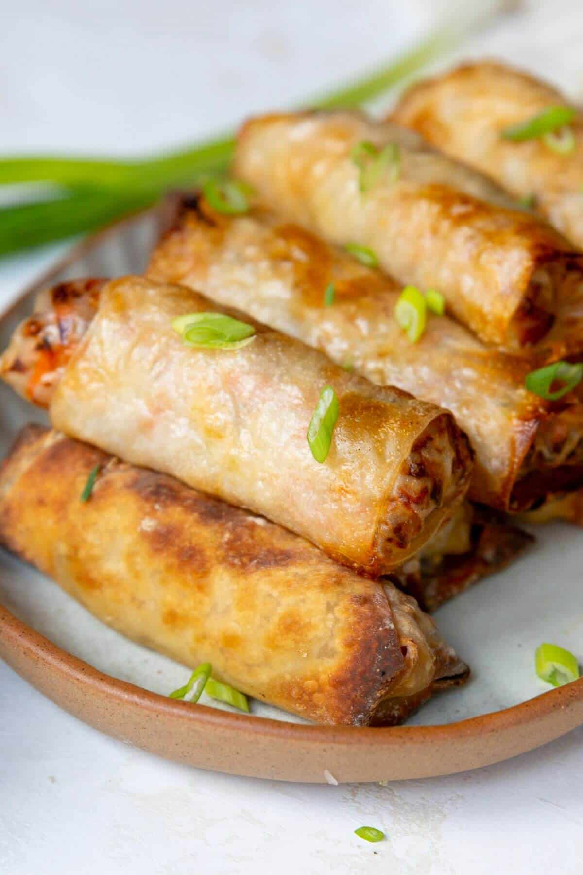 Extra crispy air fryer spring rolls made without deep frying.