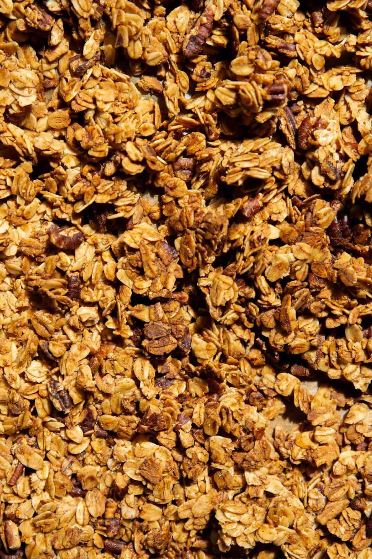Chunky homemade healthy granola, naturally sweetened with maple syrup and refined sugar-free.