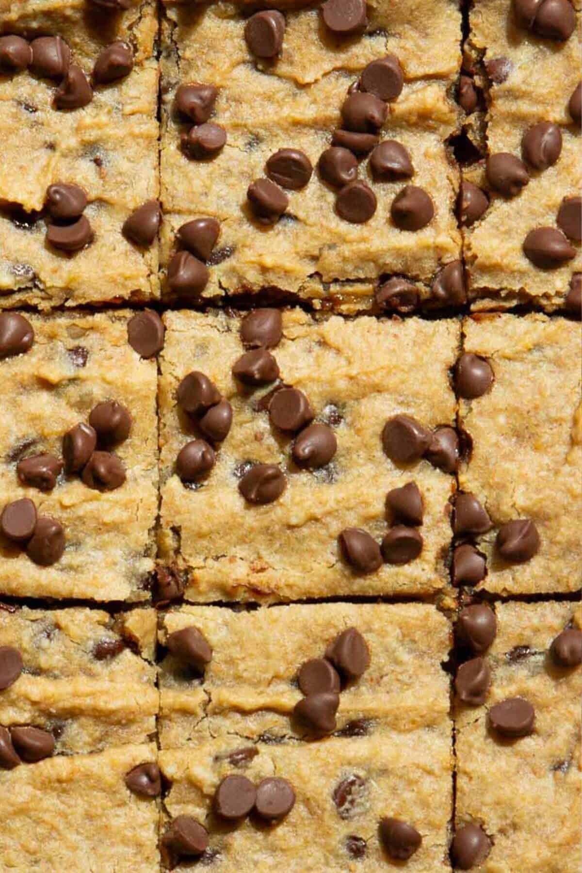 High protein peanut butter chickpea blondies sliced into squares.