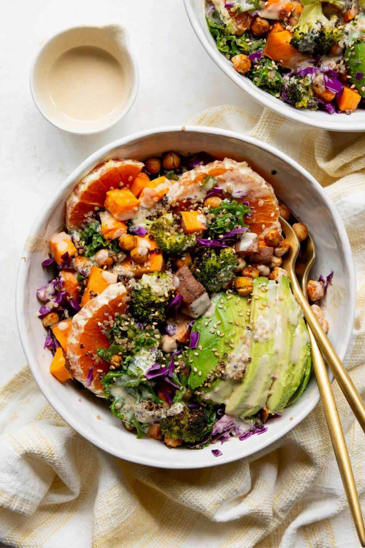 Crispy chickpea sweet potato bowls with broccoli, quinoa and cabbage.
