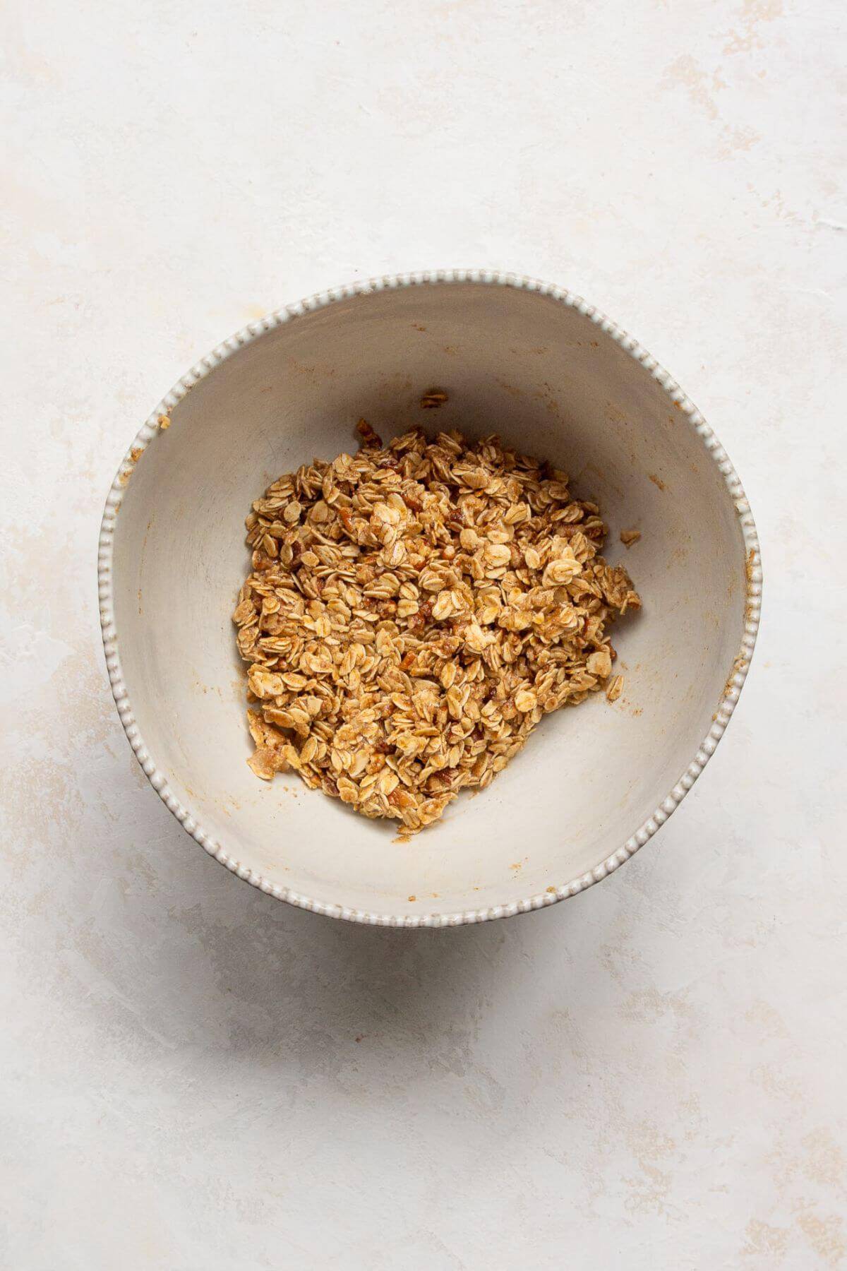 Preparing the oat crumble topping.