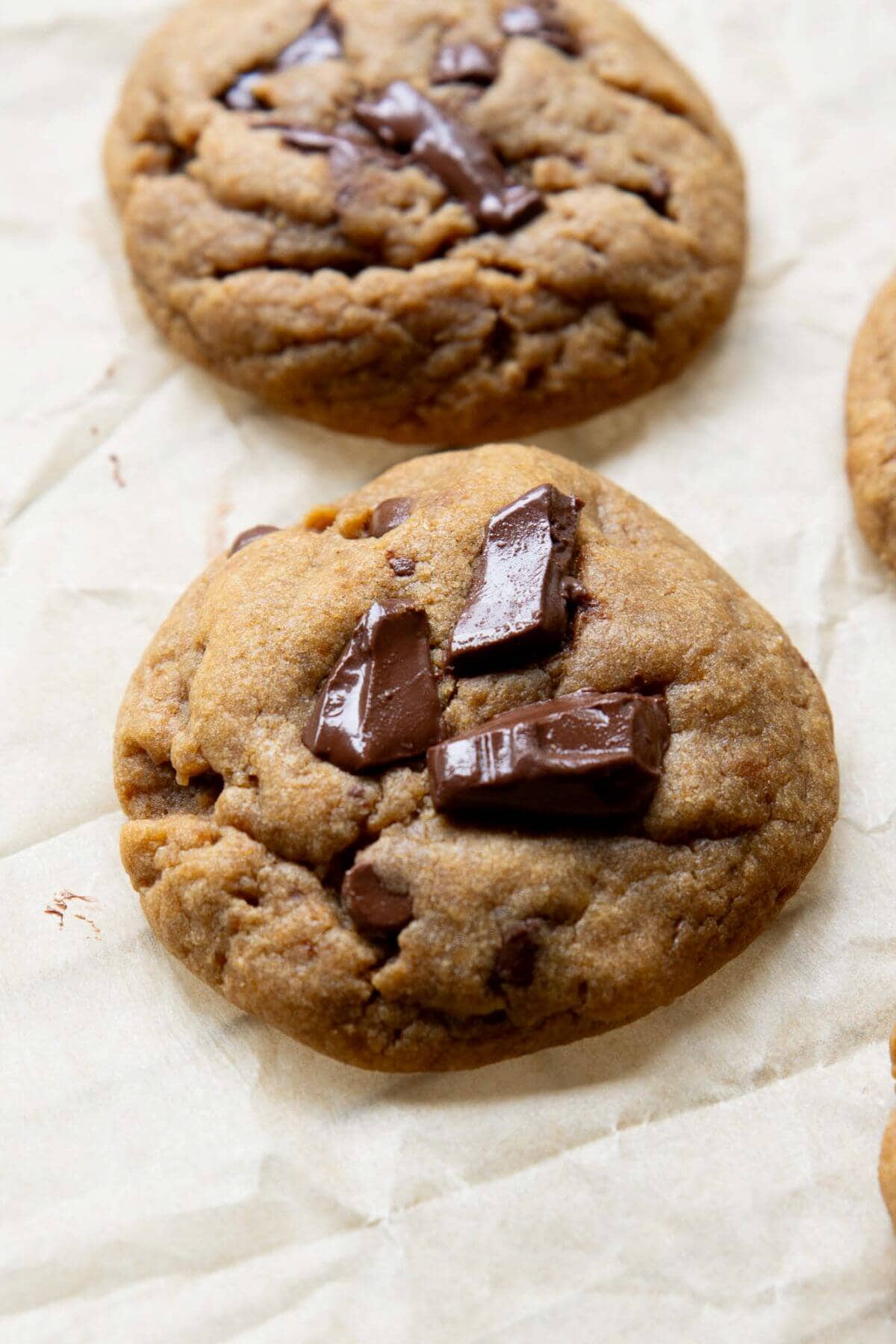 Thick and soft healthy chocolate chip cookies made without refined sugar.