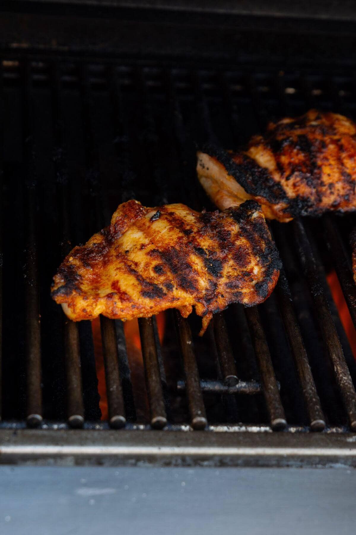 Crispy chicken thigh on the grill.