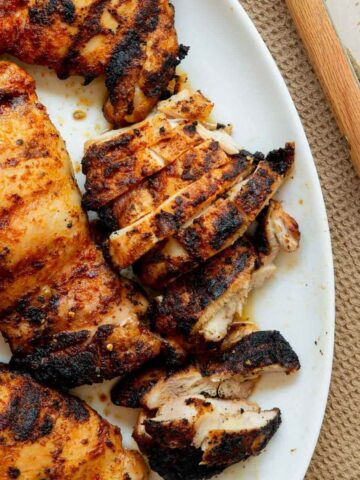 Extra juicy and crispy grilled chicken thighs made with a dry rub.