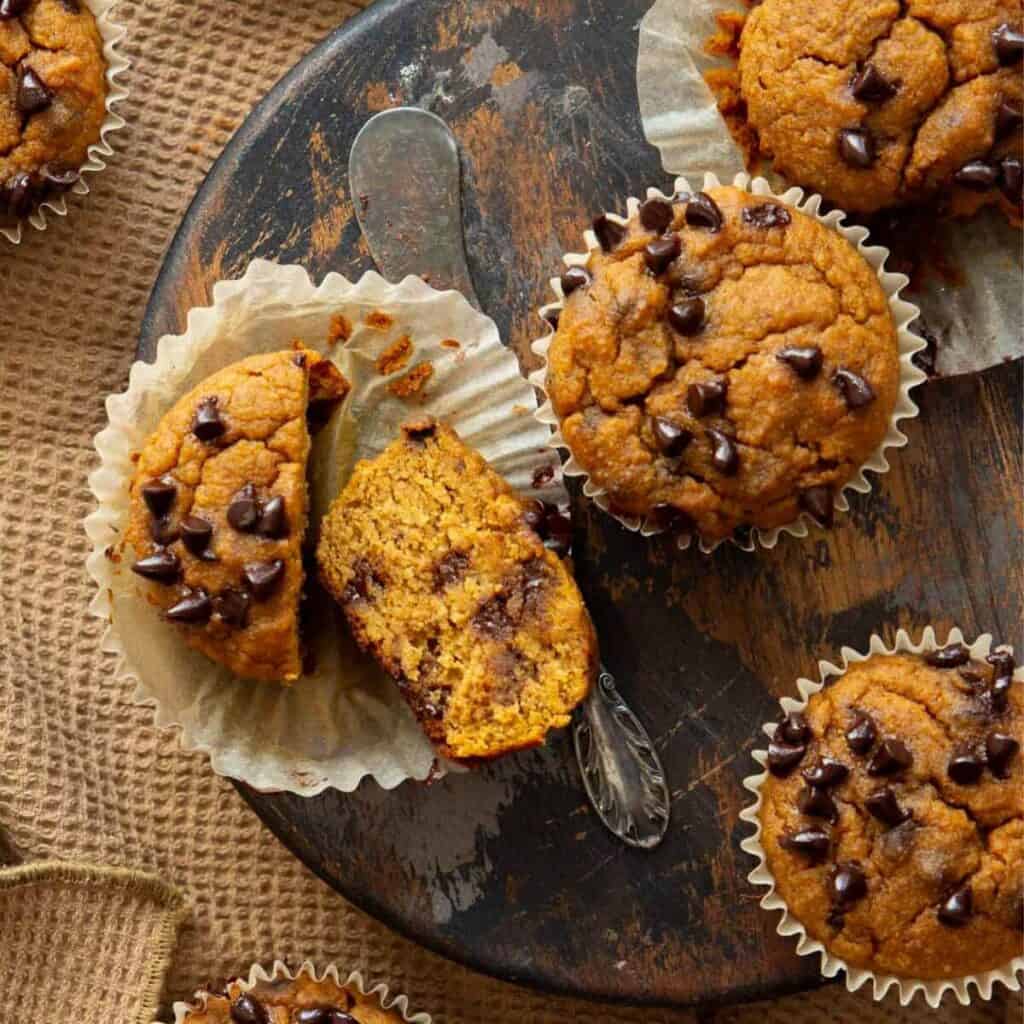 Super moist and fluffy healthy, high protein pumpkin muffins with chocolate chips.