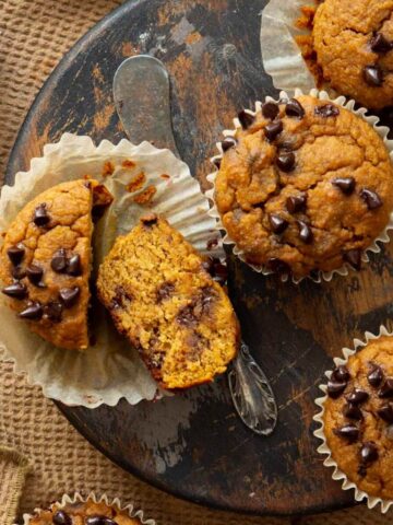 Super moist and fluffy healthy, high protein pumpkin muffins with chocolate chips.
