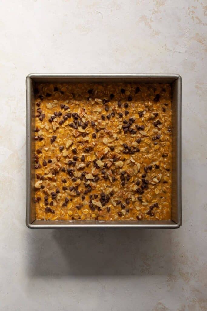 adding chocolate chips on top