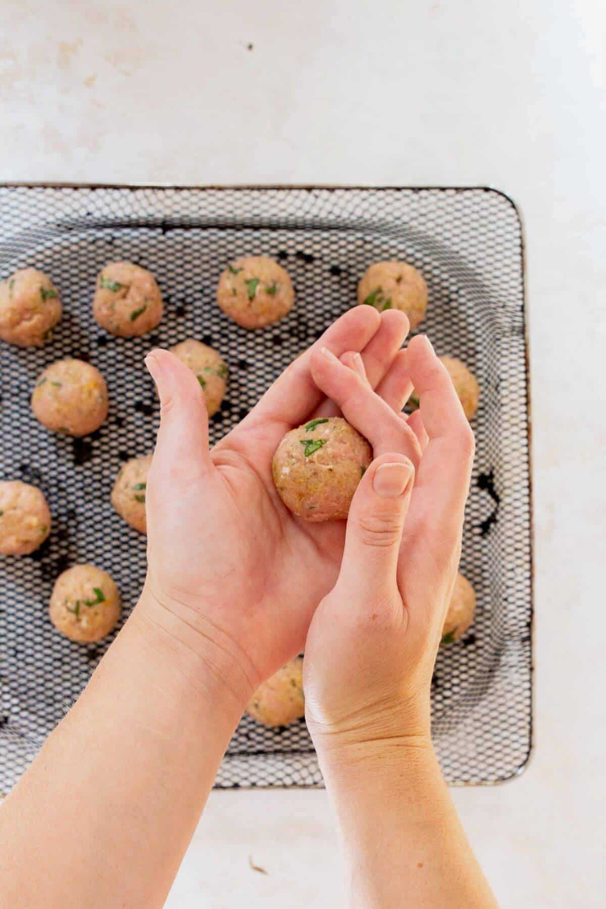 How to roll a perfect turkey meatball.