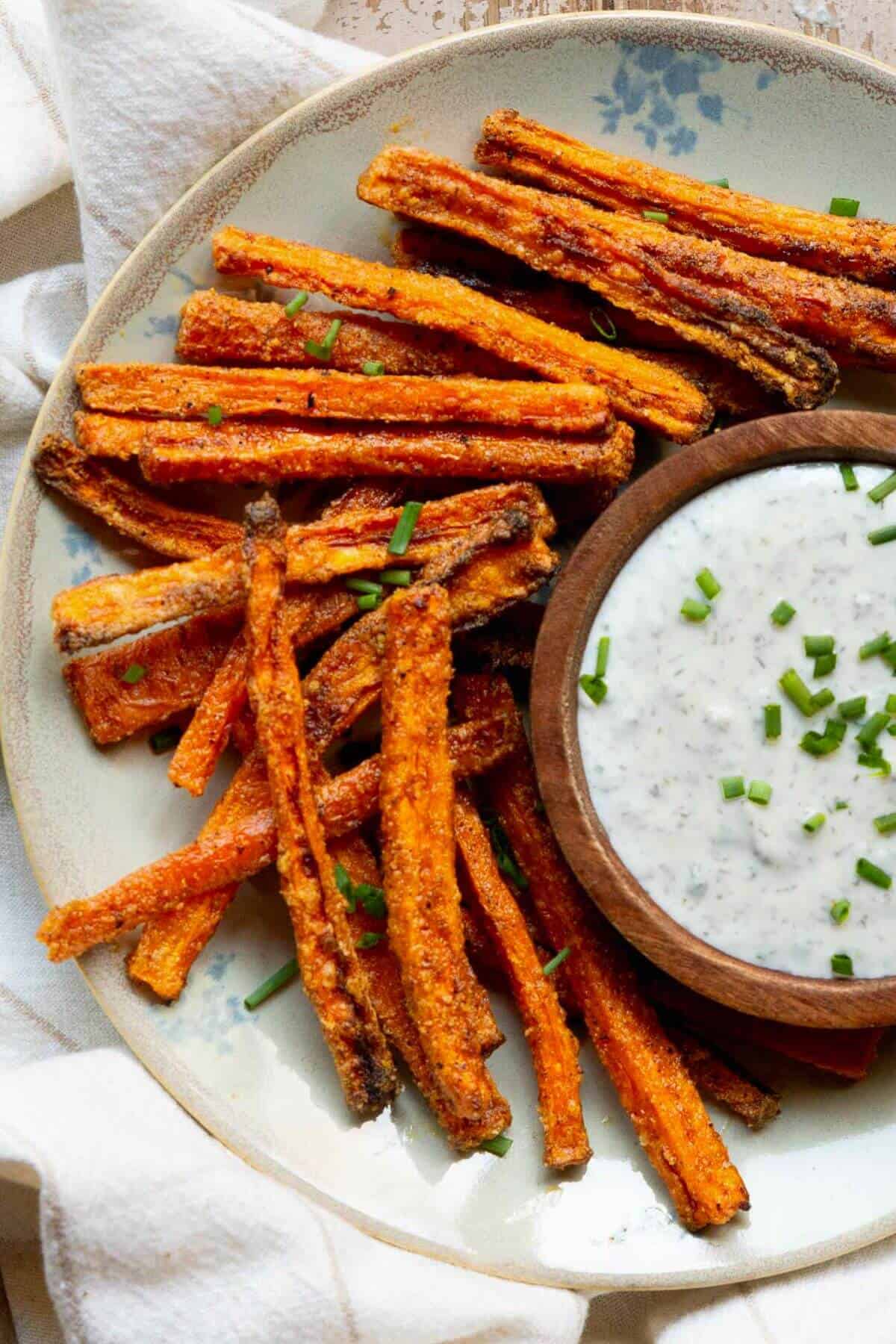 Super crispy air fryer carrot fries ready in 15 minutes.