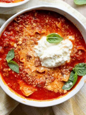 Easy, healthy one-pot lasagna soup with parmesan cheese and cottage cheese.