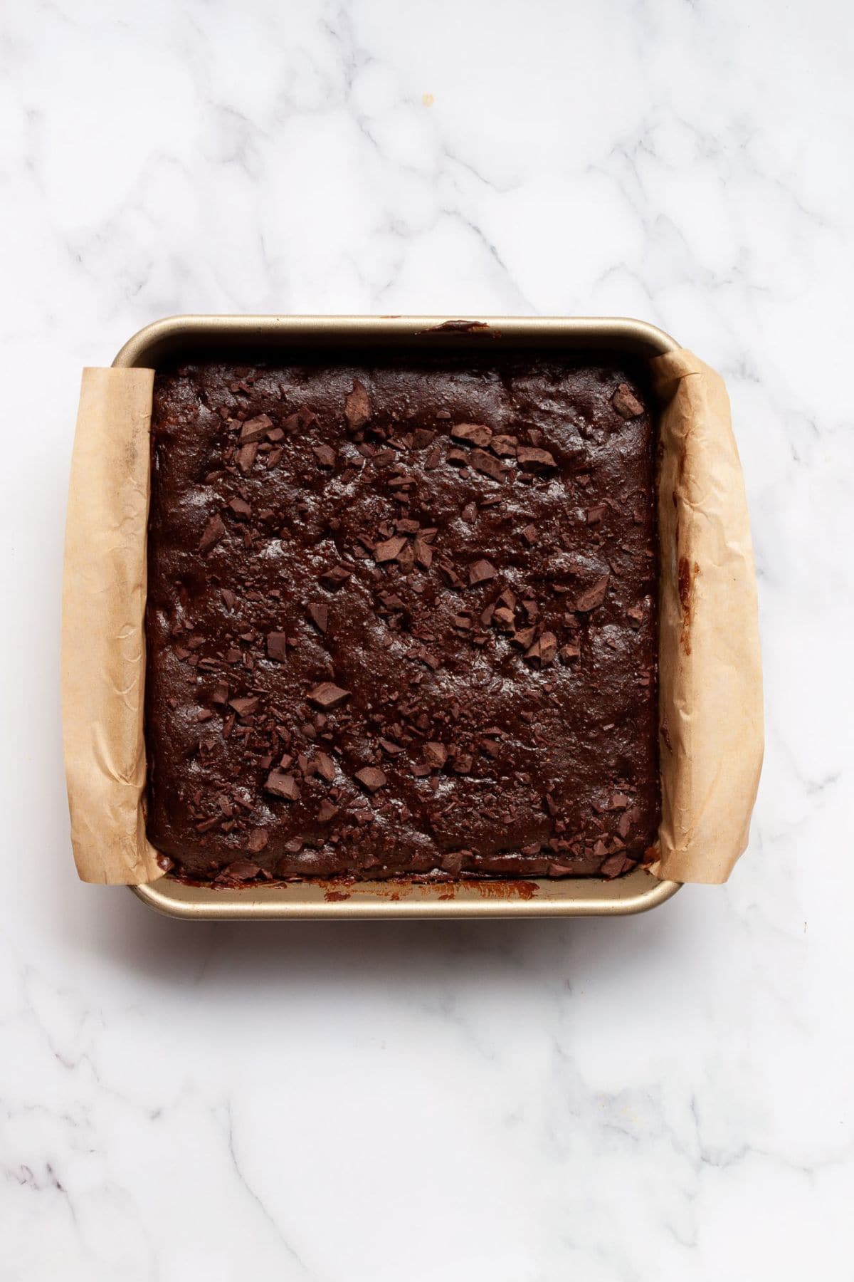 Baked flourless brownies in baking dish.