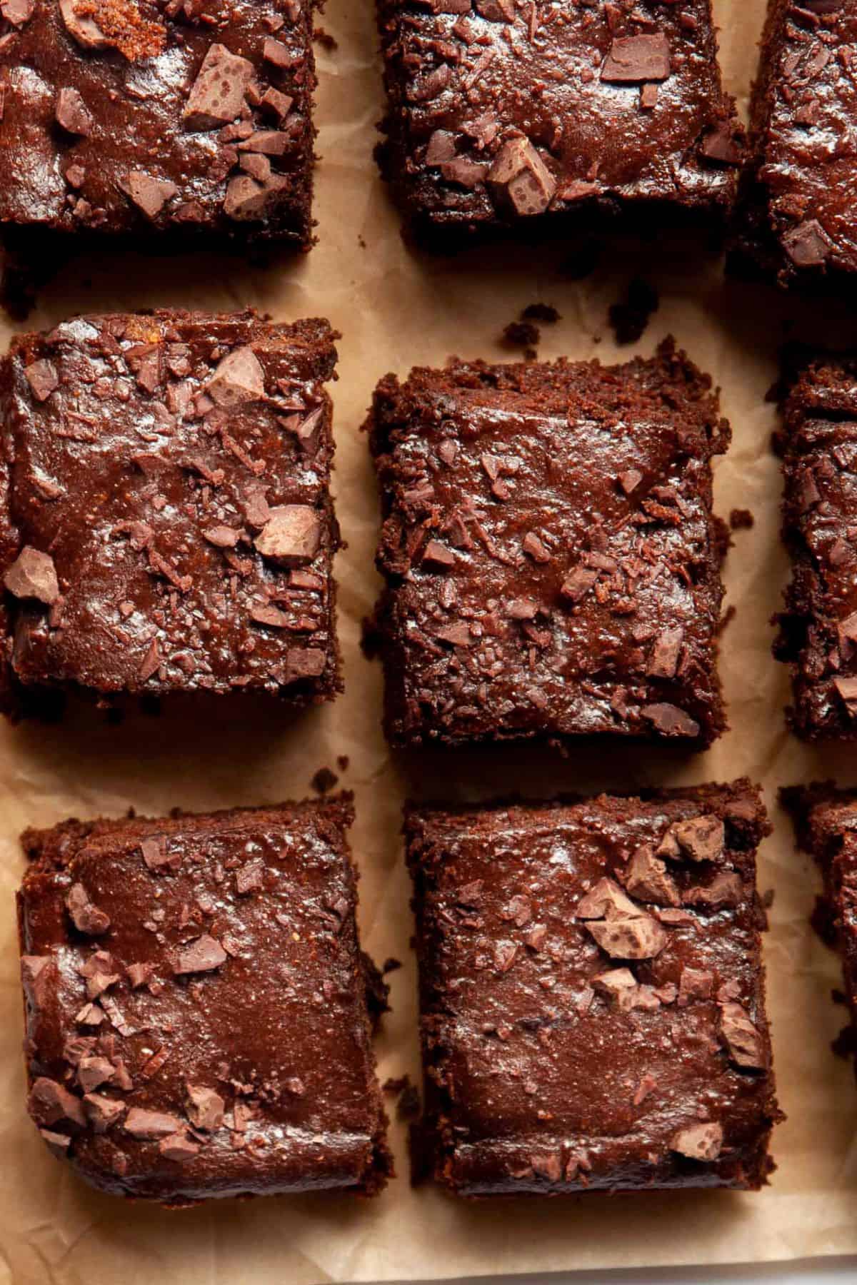 Slicing flourless brownies after cooling.
