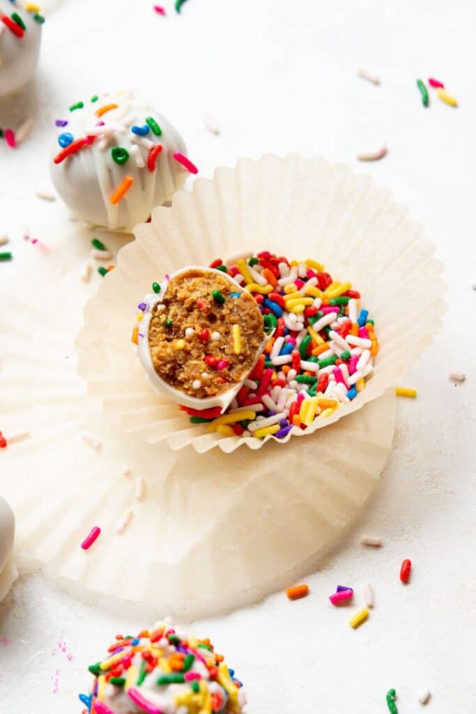 almond butter truffles with sprinkles and while chocolate
