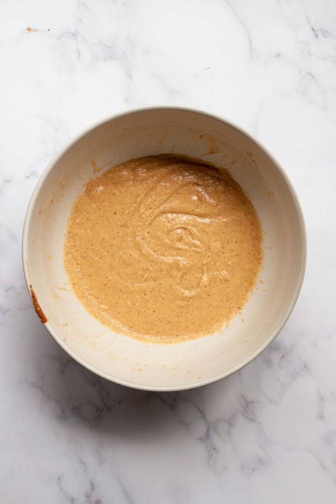 almond flour waffle batter in a bowl mixed