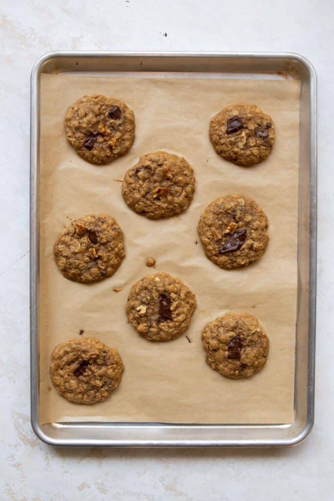 healthy oatmeal walnut cookies on a baking sheet